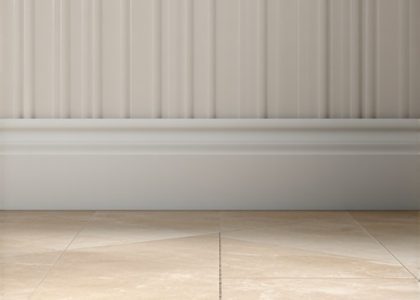 Ditch Wood: Why Stone-Composite Baseboards Win in 2026 Bathrooms