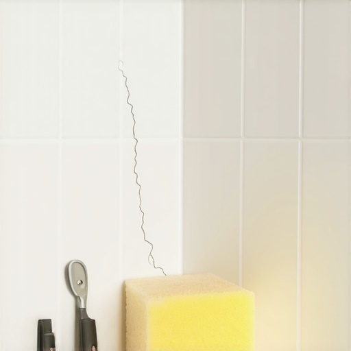 How to Fix a Hairline Crack in a Brand New Shower Tile
